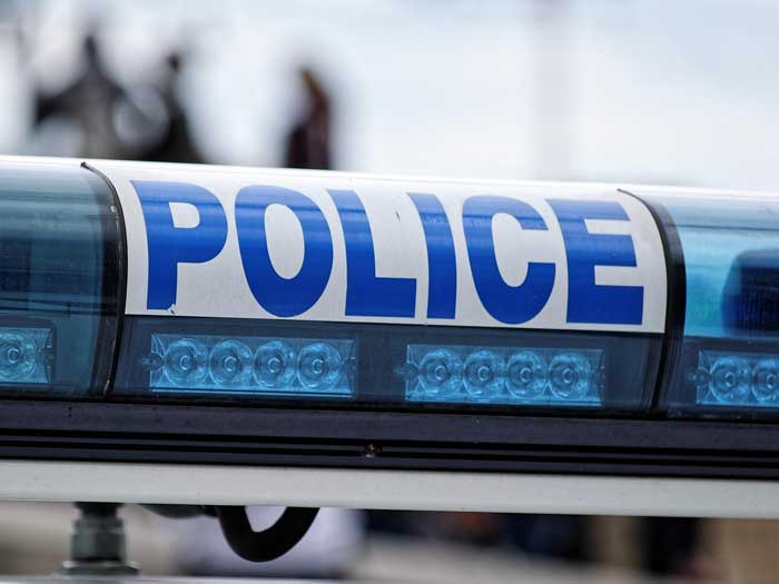 Police lamp on building